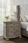 Ardenfield Queen Upholstered Sleigh Bed with Mirrored Dresser and Nightstand