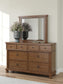 Rowlenstown King Poster Bed with Mirrored Dresser and Nightstand
