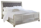 Coralayne Queen Upholstered Sleigh Bed with Mirrored Dresser and Chest